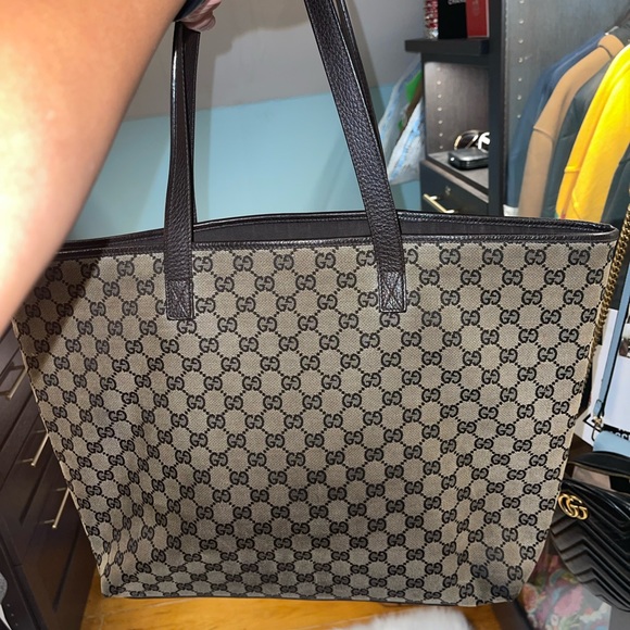Gucci Handbags - Gucci canvas tote well loved and still in pretty good condition. 257245 498879